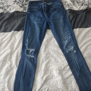 Express Distressed Mid Rise Skinny Legging Jeans